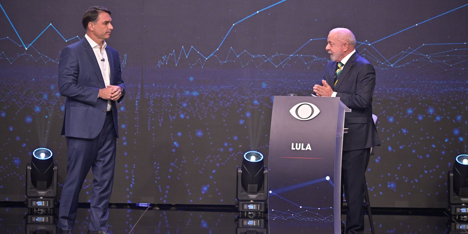 Lula e Flávio trocam acusações na Band sobre R$134 mi e segurança